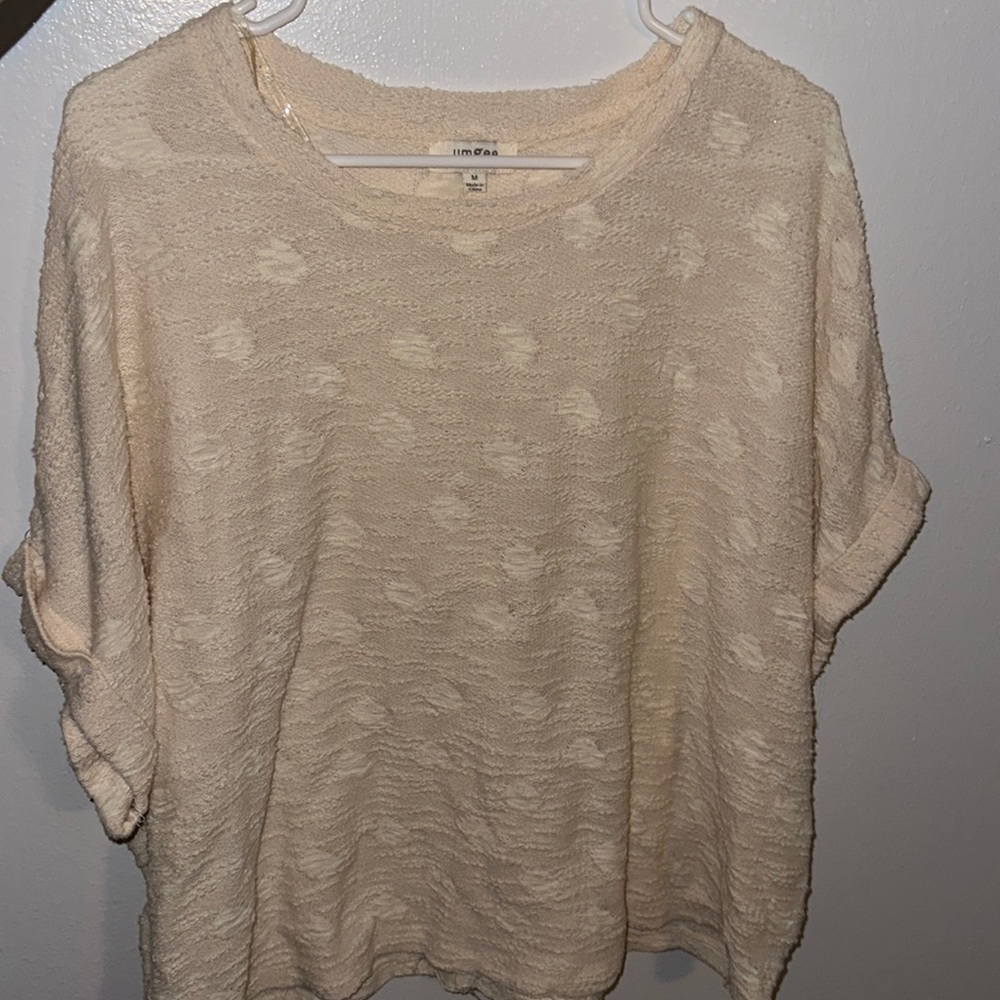 Cream over size and flowy top